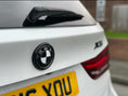 Load image into Gallery viewer, BMW X5 REAR BADGE SURROUND - GLOSS BLACK F15 F16 F85 F86
