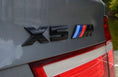 Load image into Gallery viewer, BMW X5M REAR TRUNK BLACK EMBLEM BADGE - GLOSS BLACK E53 E70 F15 G05
